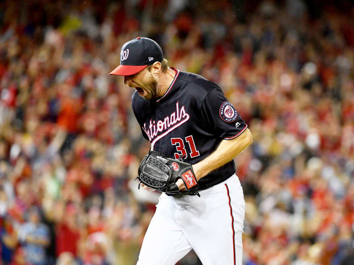 Oct 7, 2019; Washington, DC, USA; Washington Nationals starting pitcher Max Scherzer (31) reacts after the last out of the top of the seventh inning against the Los Angeles Dodgers in game four of the 2019 NLDS playoff baseball series at Nationals Park. Mandatory Credit: Brad Mills-USA TODAY Sports